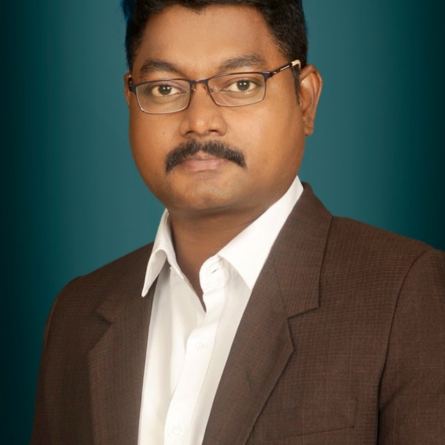 T Devanand